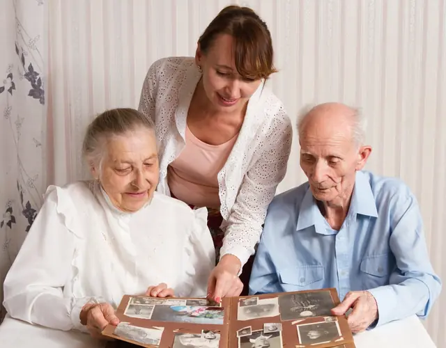 Home Senior Couple With Caregiver Nurse 640