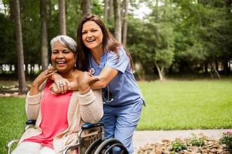 Nurse and an old woman in the park