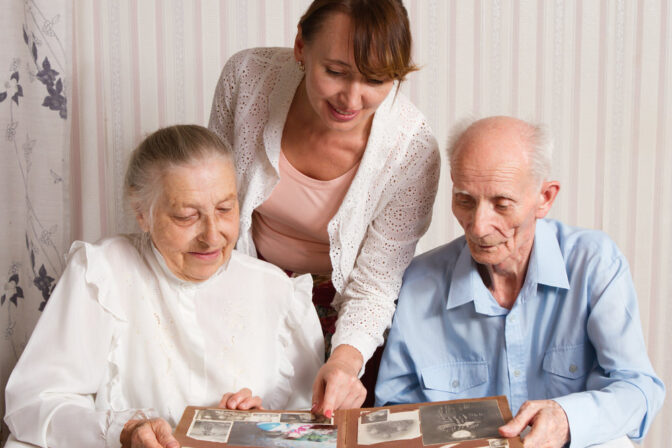 Senior Man, Woman with their Caregiver at Home. Concept of Health Care for Elderly Old People, Disabled